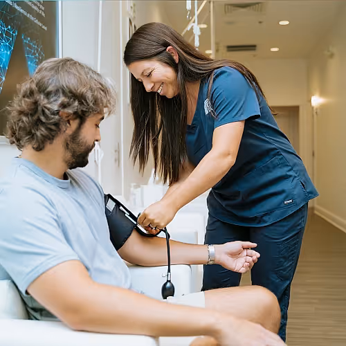 Clients discussing pain management options with a licensed nurse in a supportive setting.
