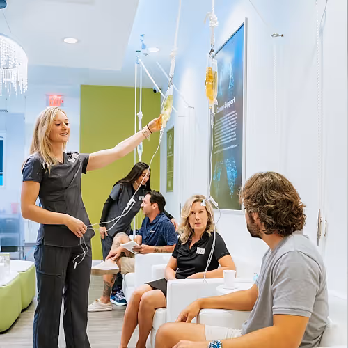 Lounge area at The DRIPBaR where clients relax after receiving post-workout recovery services.