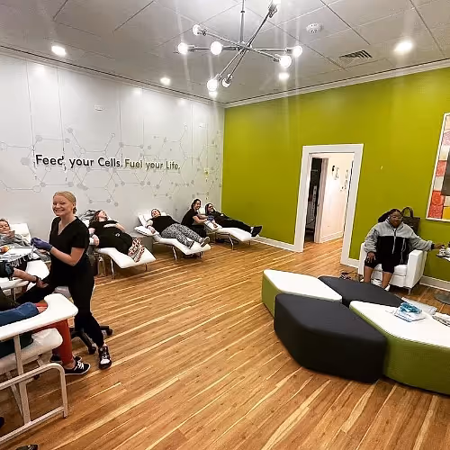 Modern IV therapy lounge with comfortable seating and calming atmosphere at The DRIPBaR Hammond.