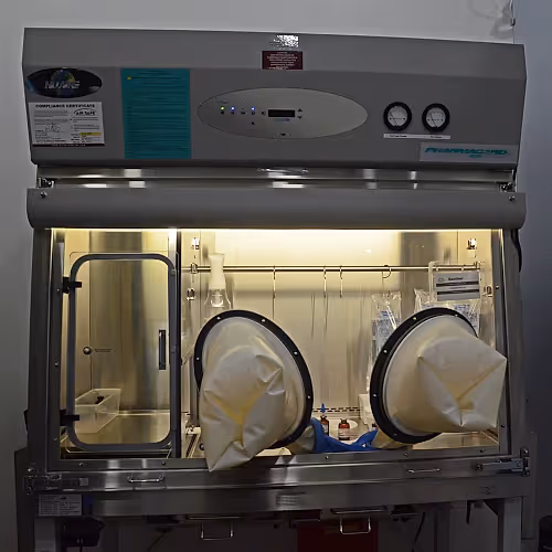 IV therapy room with medical equipment and comfortable seating for nutrient infusions.