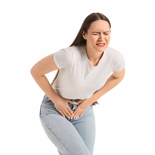 Person practicing pelvic floor relaxation breathing, focusing on gentle exhales and belly softening.