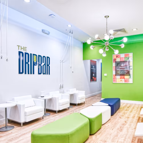 Comfortable seating area in a wellness lounge designed for relaxation and recovery.